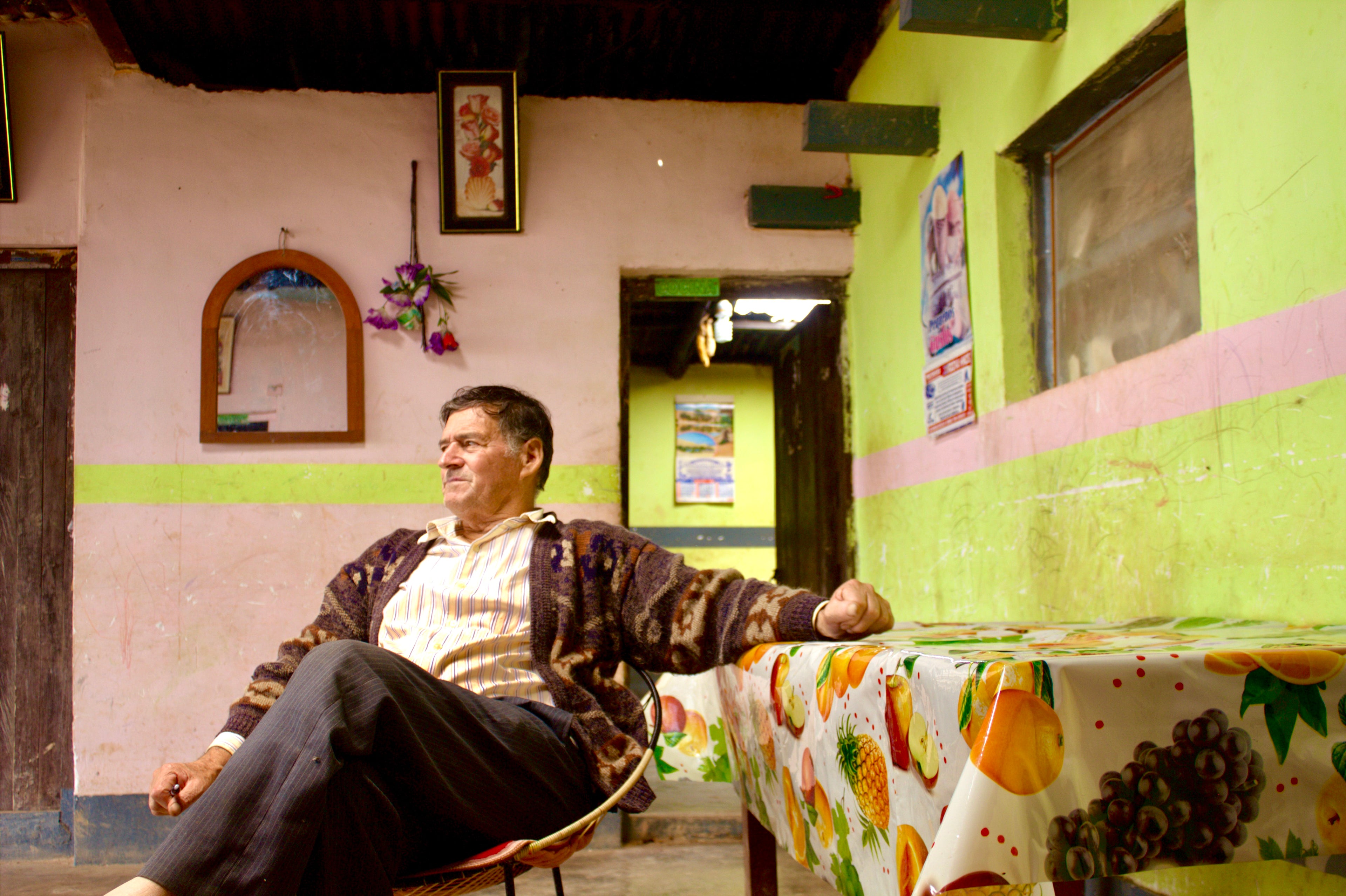 Bird and Bear coffee producer Sergio Palermo sits in his kitchen at his Los Alisos farm in Peru